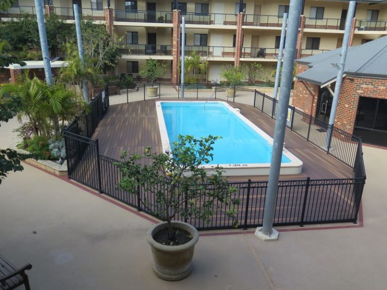 Pool fully enloced with an aluminium fence.